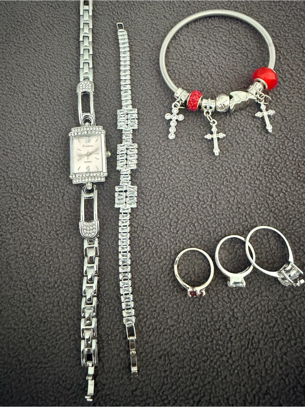 Silver Charm Bracelet with Red Accent and Cross Charms